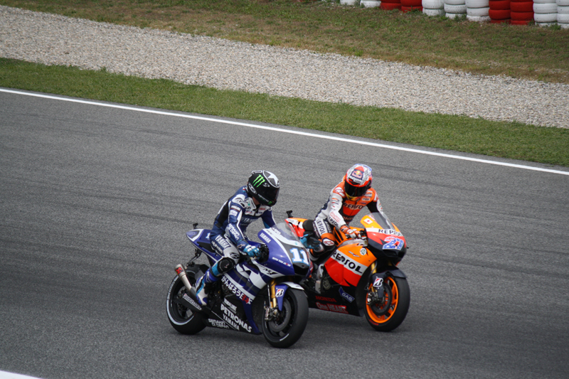 Benny Spies congratulates Casey Stoner on his victory